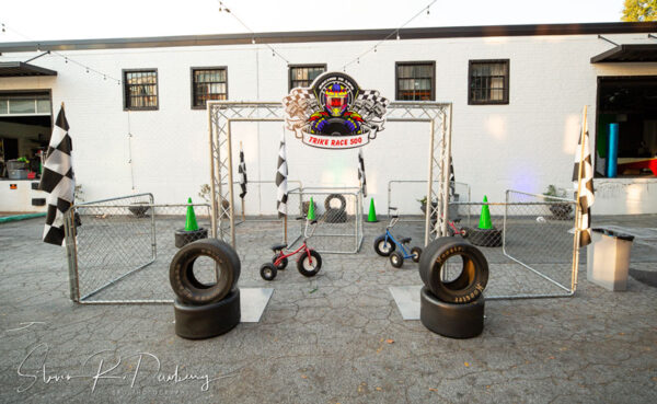 Tricycles were set up in front of a building.