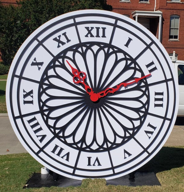 A Giant Clock with roman numerals on it.