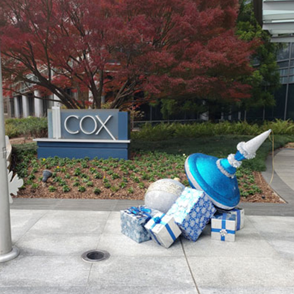 The front side of cox building with gifts on the floor. Past Events Gallery